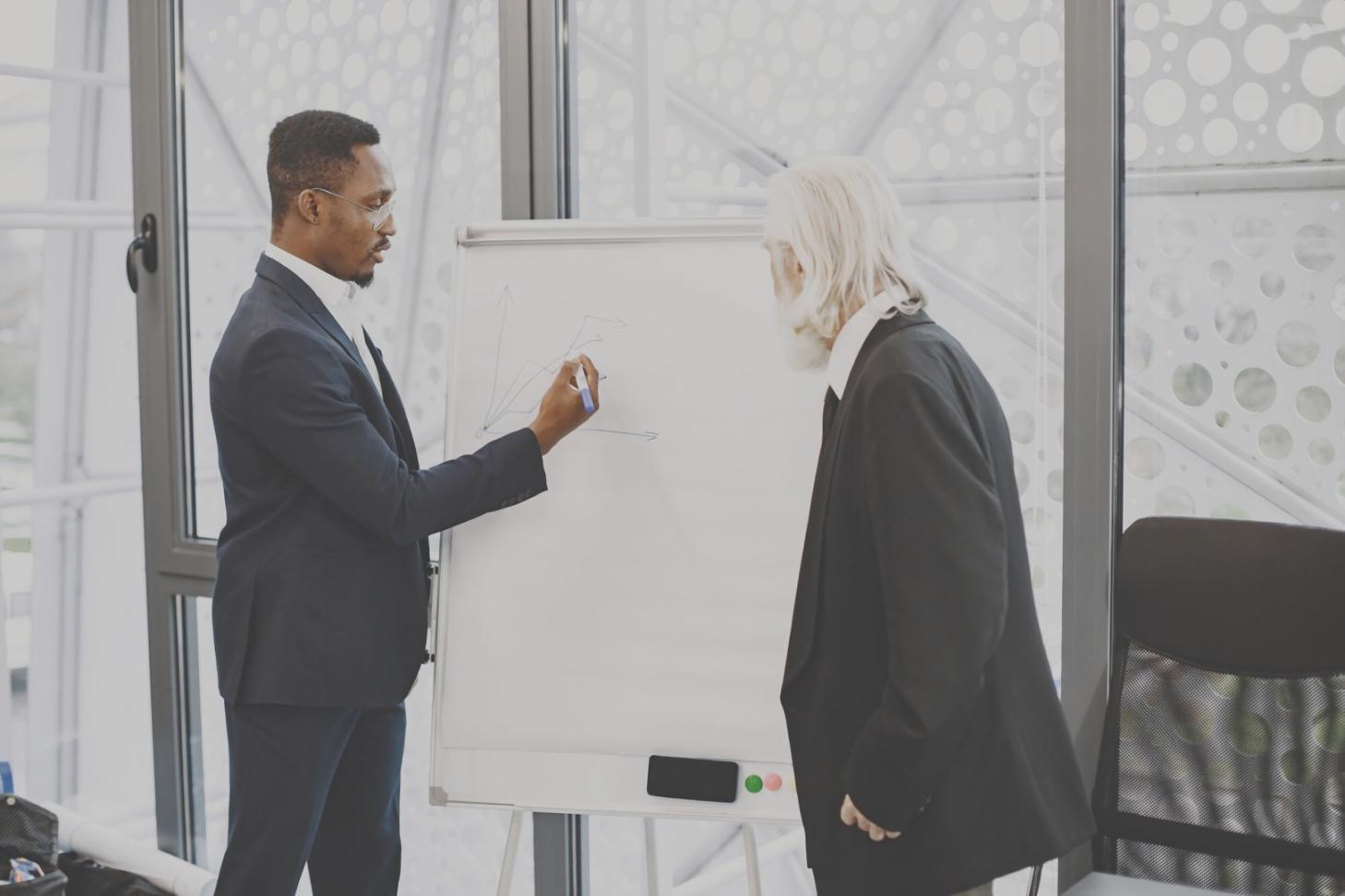 Person reviewing business performance metrics and analysis reports